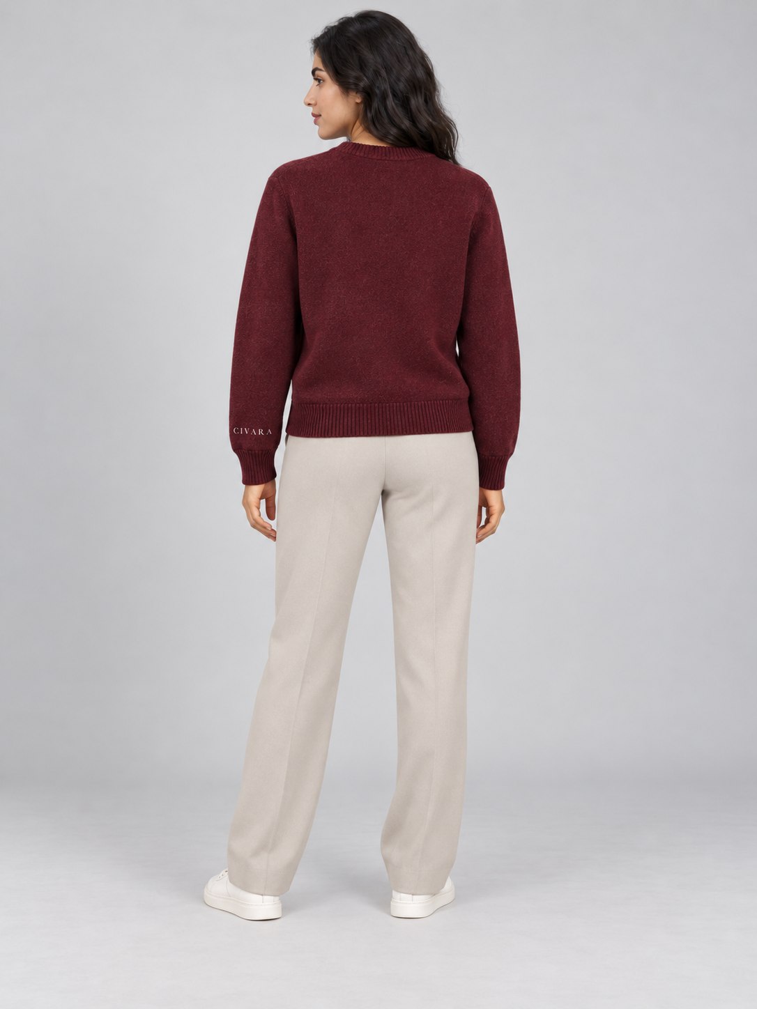 The Sceptre Crew from behind, wide-leg trousers.